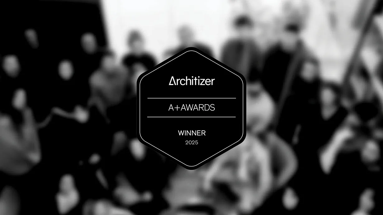 Architizer A+ Awards Winner 2025 badge over a blurred black-and-white photo of a group of people