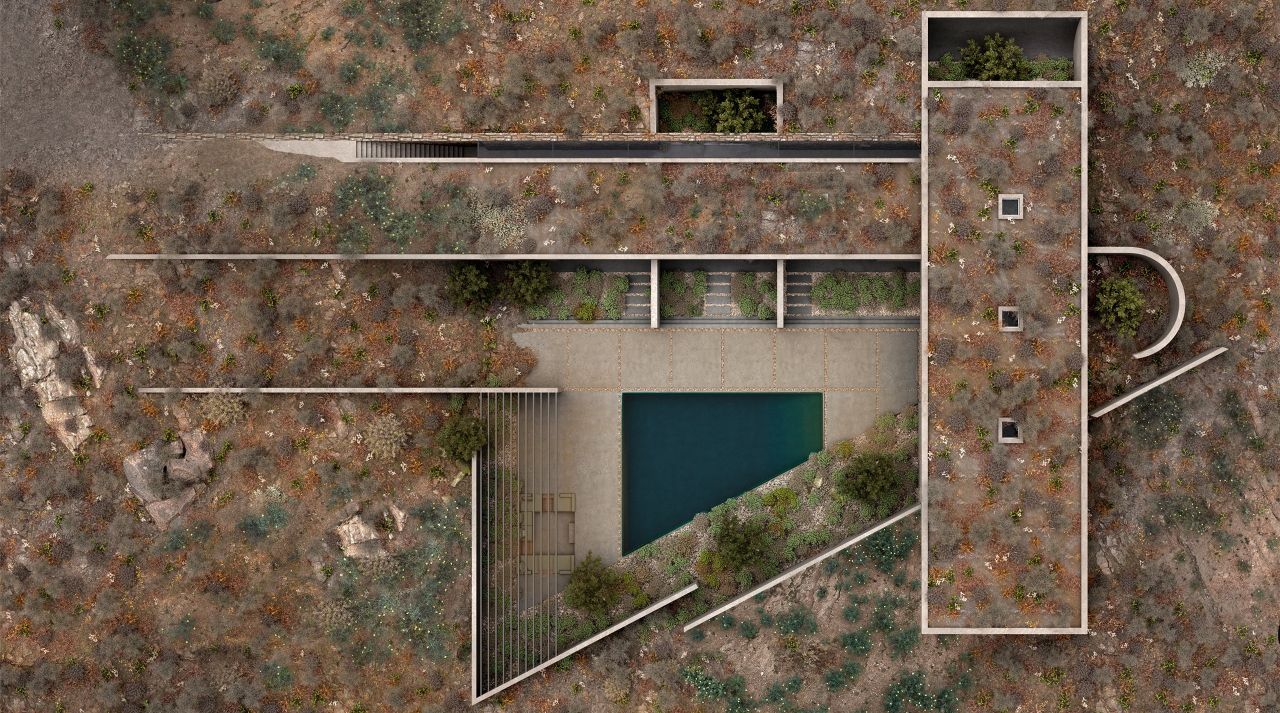 Aerial rendering of Casa C from above: planted roof, triangular courtyard and dark pool on a rocky slope