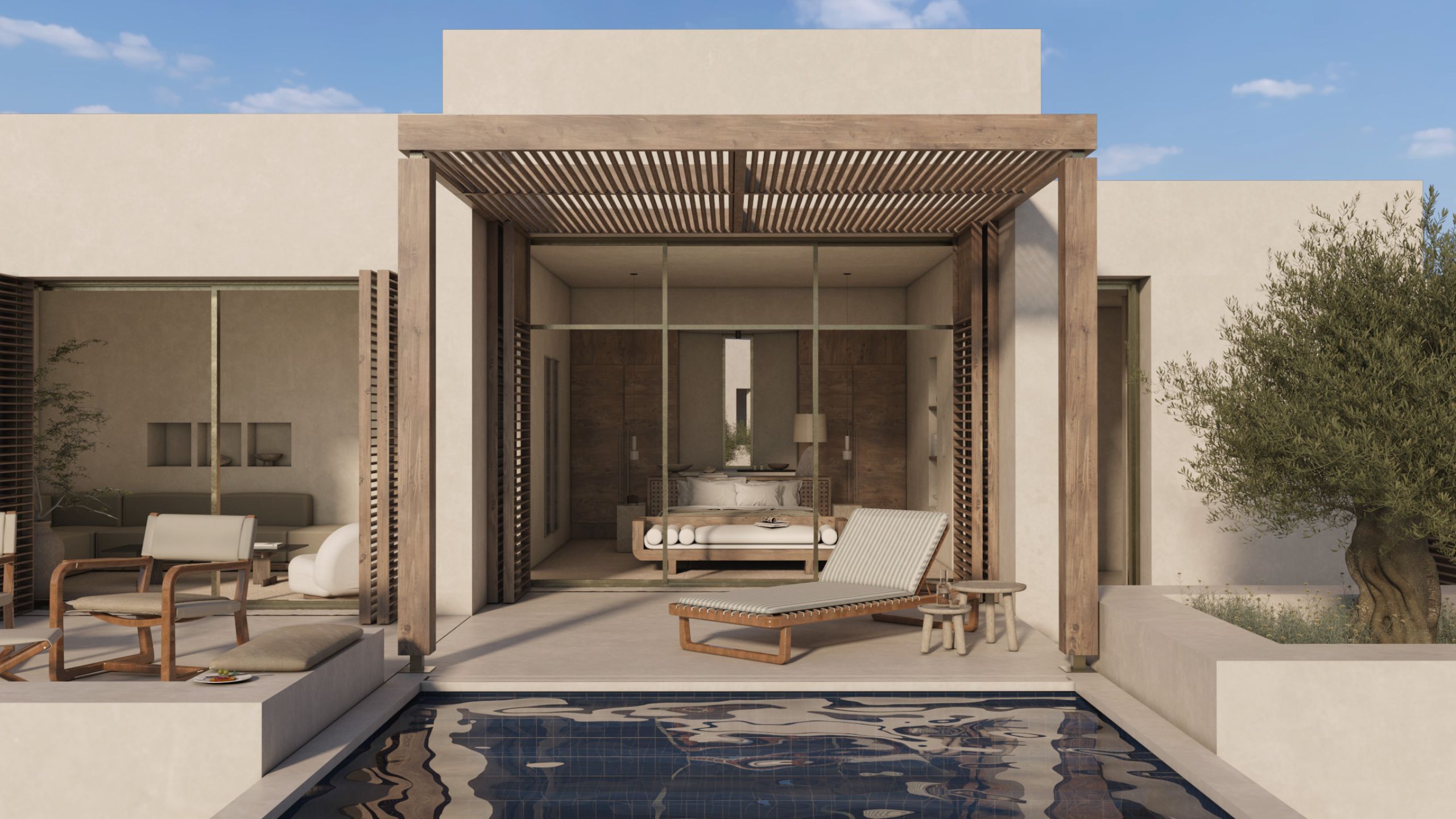 Suite opening onto a terrace with a timber pergola, a lounger and a private pool, beside an olive tree