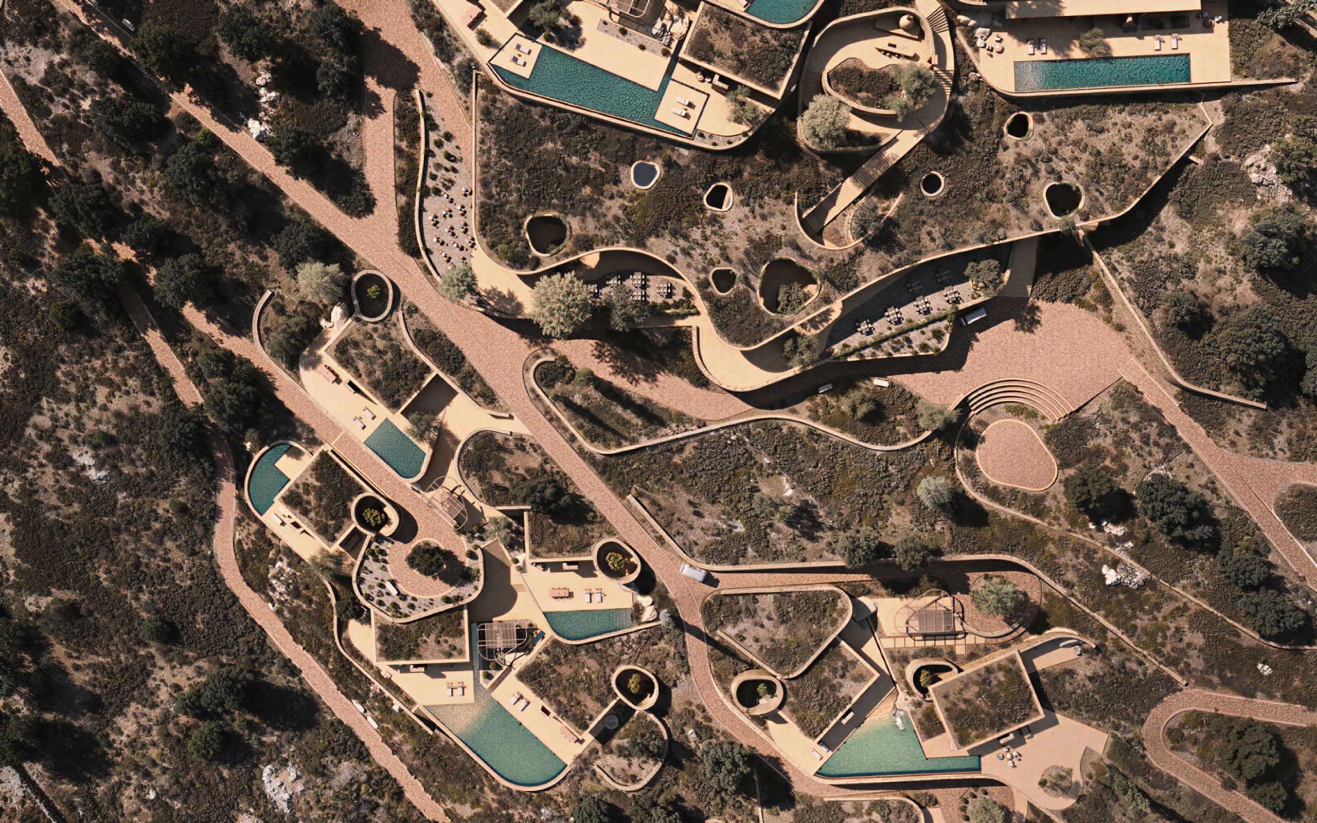 Rendering of Shared Ground from directly above, curving stone walls, courtyards and turquoise pools among olive trees