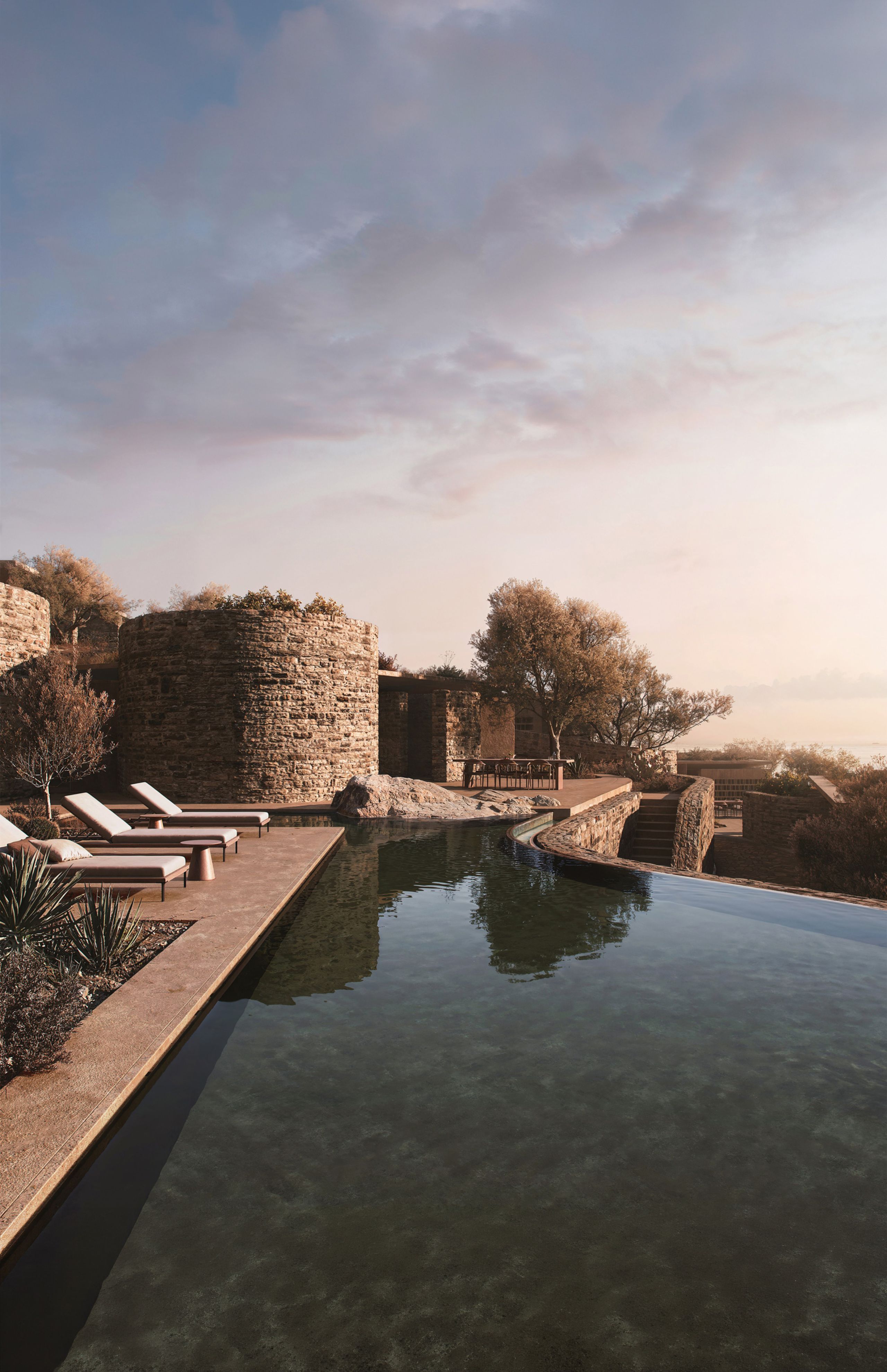 Rendering of a long reflecting pool at Shared Ground, with sun loungers beside a round stone tower and olive trees